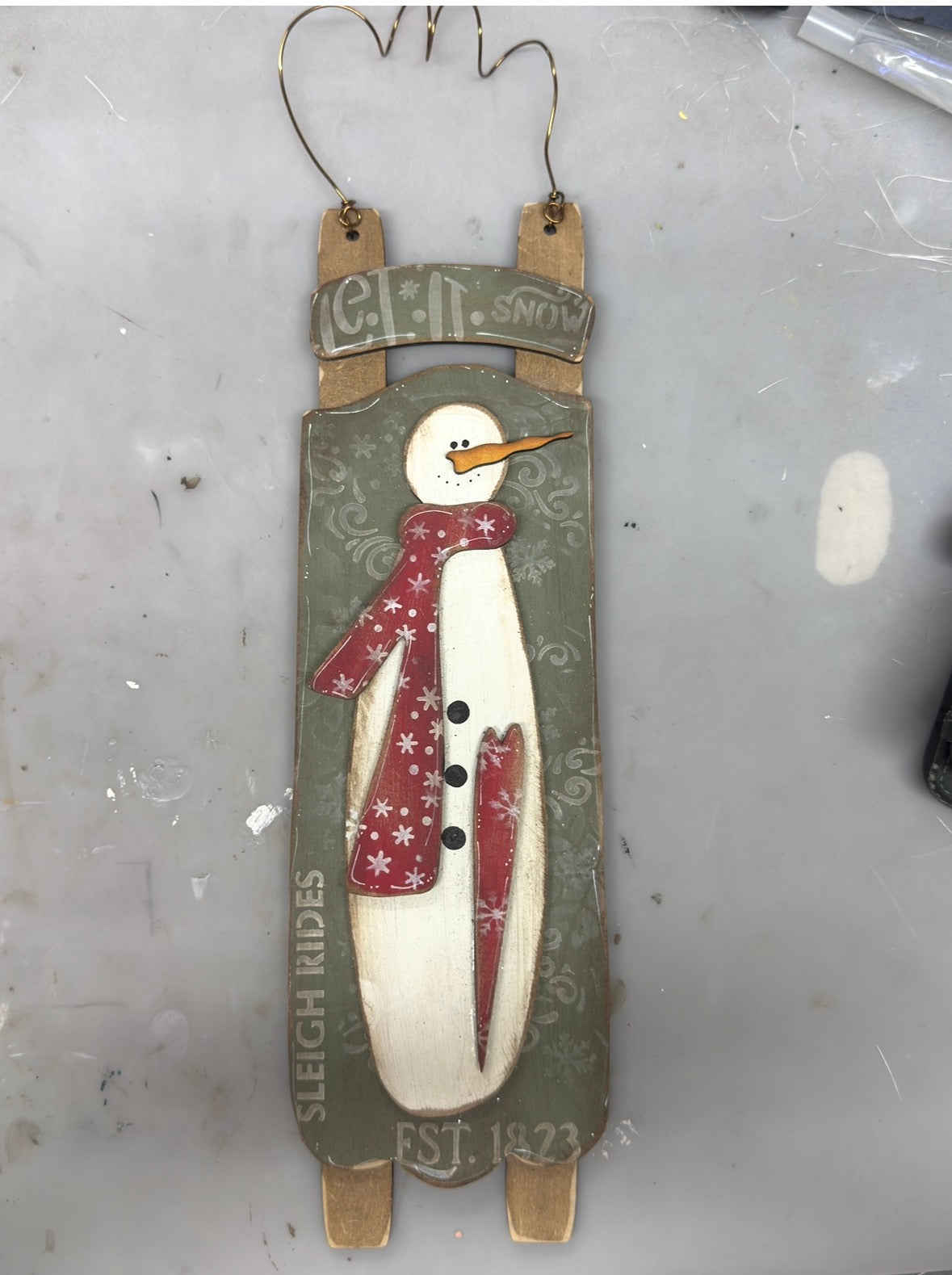 Snowman on sled