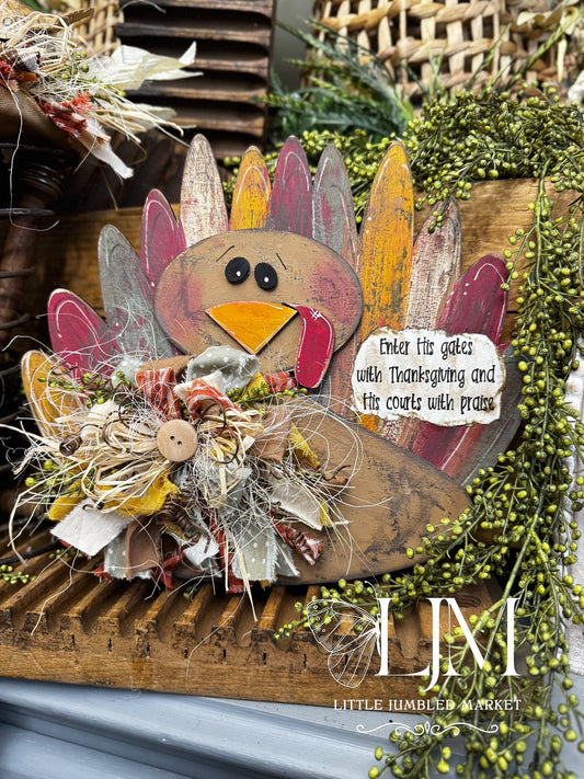 Turkey sitting with wonky feathers #172